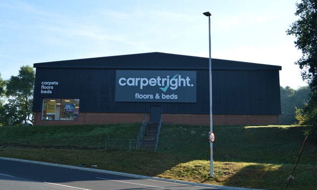 Carpetright shares dive following profit warning