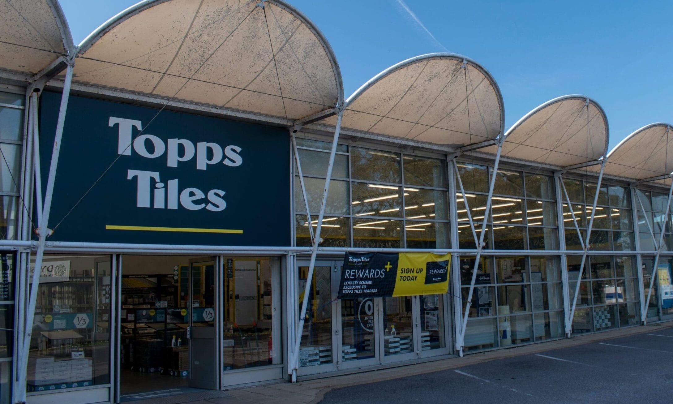 Topps Tiles sees interim HY sales and profits boost
